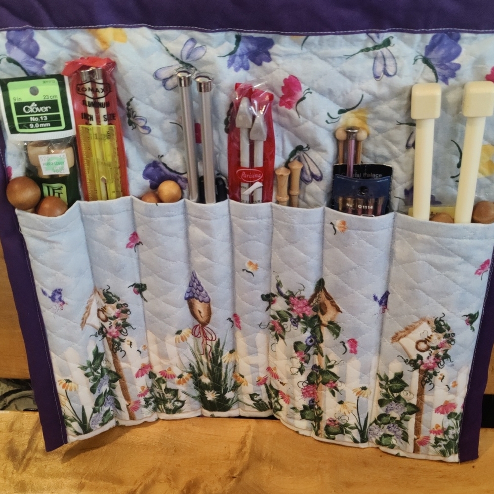 Floral Knitting Needle Organizer With Multiple Size And Type Knitting Needles